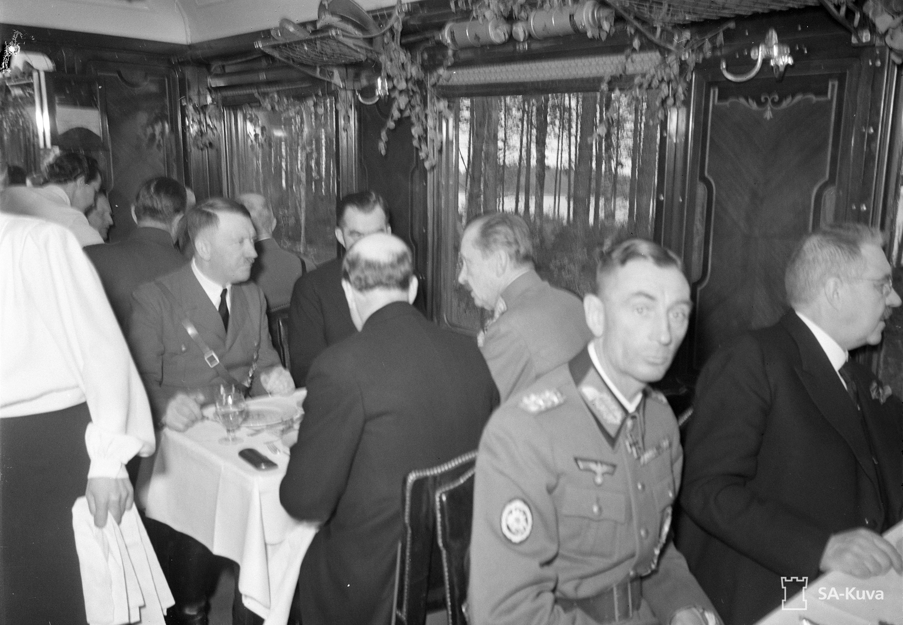 Adolf Hitler dining in the train with Finnish Prime Minister Jukka Rangell, President Risto Ryti and Marshal Carl Gustav Mannerheim